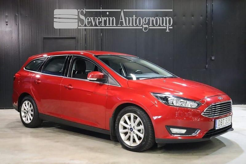 Röd Begagnad 2015 Ford Focus Titanium Kombi | 69 000 kr (Marknadspris) - Bild 1/4