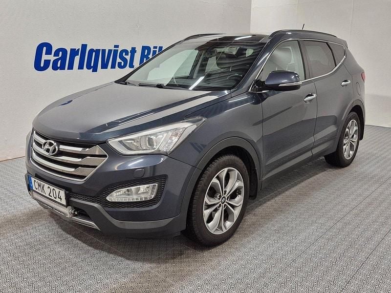 Ljusblå (blå metallic) Begagnad 2014 Hyundai Santa Fe Premium SUV | 149 000 kr (Marknadspris) - Bild 1/4
