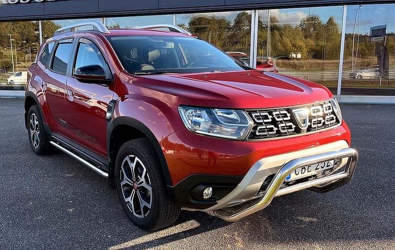 Röd (rödmetallic) Begagnad 2019 Dacia Duster SUV | 184 500 kr (Marknadspris) - Bild 1/2