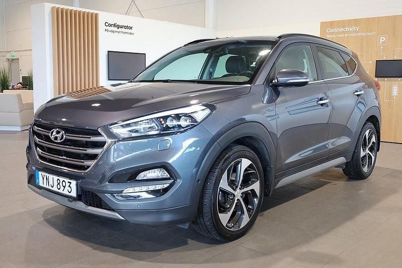 Mörkgrå (micron grey metallic ) Begagnad 2017 Hyundai Tucson Premium SUV | 199 800 kr (Marknadspris) - Bild 1/3