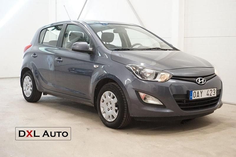 Ljusbrun (brun) Begagnad 2014 Hyundai i20 Select Halvkombi | 23 900 kr (Marknadspris) - Bild 1/4