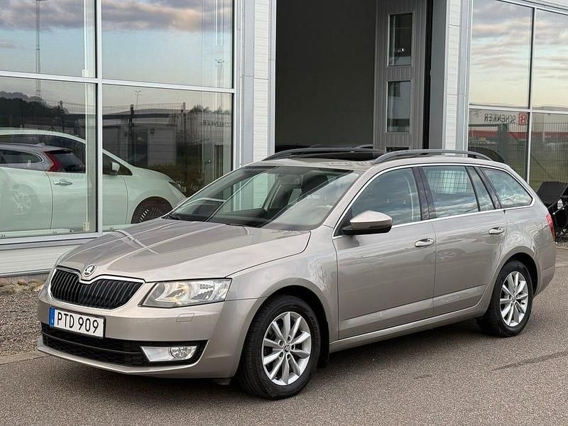 Ljusbrun Begagnad 2014 Skoda Octavia Ambition Kombi | 69 800 kr (Marknadspris) - Bild 1/4