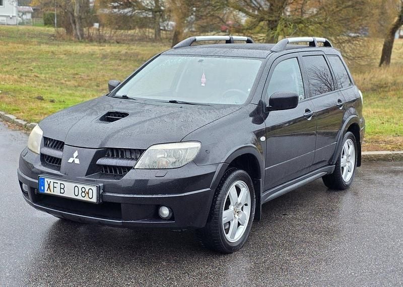 Svart Begagnad 2006 Mitsubishi Outlander SUV | 29 900 kr (Bra pris) - Bild 1/4