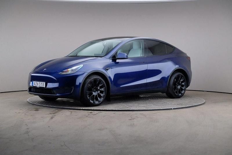 Blå Begagnad 2021 Tesla Model Y Long Range SUV | 319 000 kr - Bild 1/4