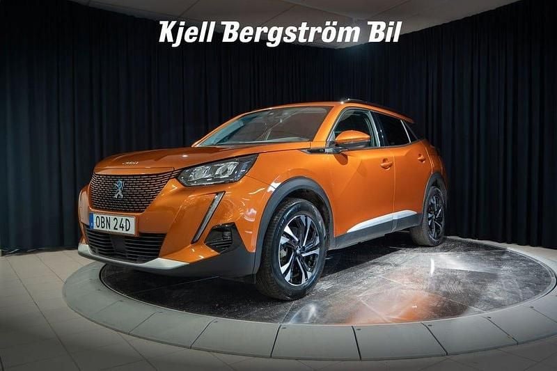 Orange Begagnad 2021 Peugeot e-2008 SUV | 185 000 kr (Marknadspris) - Bild 1/4