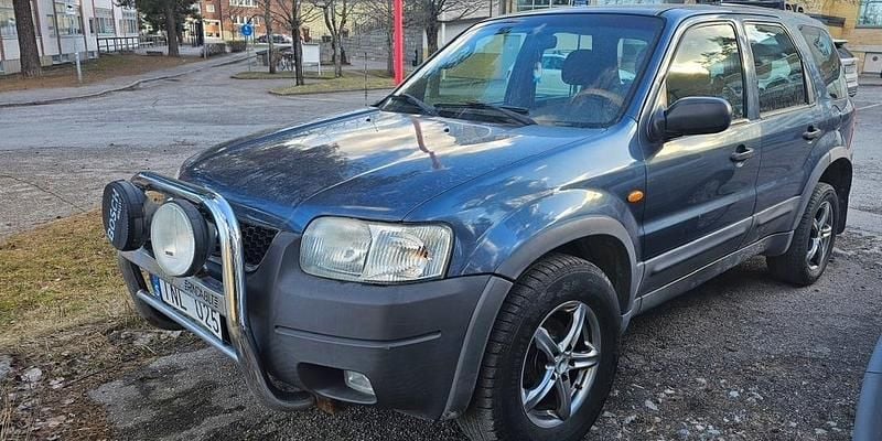Blå Begagnad 2001 Ford Maverick XLT SUV | 24 000 kr - Bild 1/4