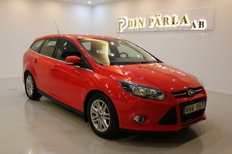 Röd Begagnad 2014 Ford Focus Kombi | 64 900 kr (Marknadspris) - Bild 1/4