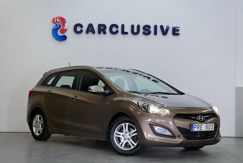 Ljusbrun (brun) Begagnad 2013 Hyundai i30 Kombi | 69 900 kr (Marknadspris) - Bild 1/4
