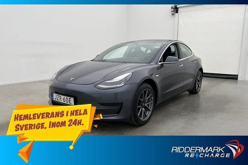 Grå Begagnad 2019 Tesla Model 3 Standard Range Plus Sedan | 229 800 kr (Marknadspris) - Bild 1/3