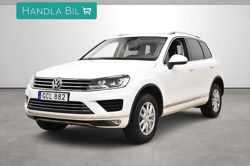 Vit Begagnad 2015 VW Touareg SUV | 189 900 kr (Marknadspris) - Bild 1/4