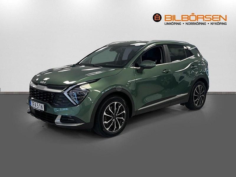 Grön (/exg/ experience green) Begagnad 2022 Kia Sportage Advance SUV | 329 900 kr (Marknadspris) - Bild 1/4