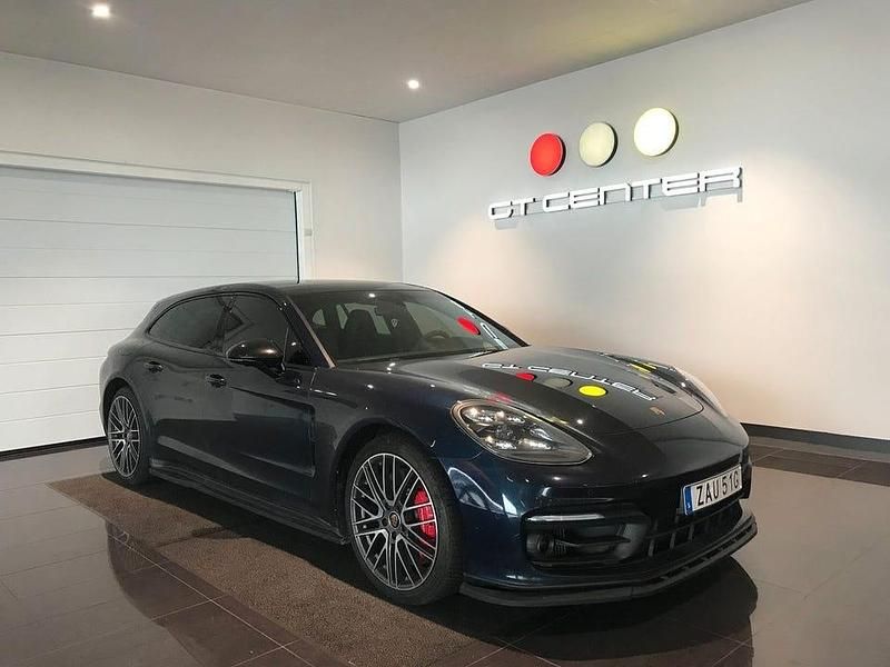Night blue metallic/svart helläder Begagnad 2021 Porsche Panamera Sport Turismo Kombi | 869 900 kr - Bild 1/4
