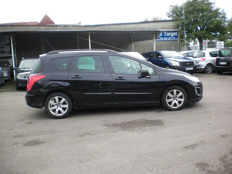 Begagnad Peugeot 308 SW 112 HK (82 kW) 2011 Svart Kombi