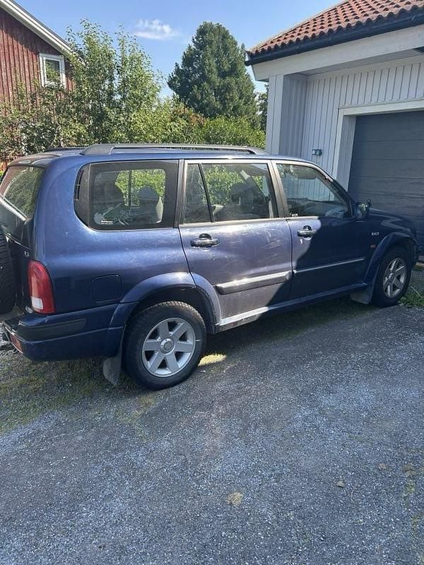 Blå Begagnad 2003 Suzuki Grand Vitara SUV | 25 000 kr - Bild 1/4