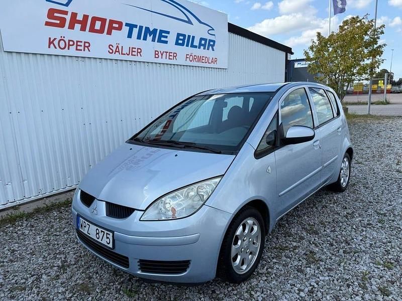 Blå Begagnad 2005 Mitsubishi Colt Halvkombi | 24 900 kr (Lite dyr) - Bild 1/4