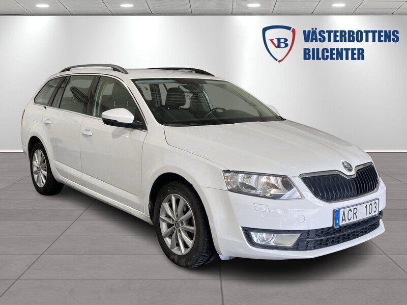 Vit Begagnad 2014 Skoda Octavia Ambition Kombi | 89 900 kr (Marknadspris) - Bild 1/4