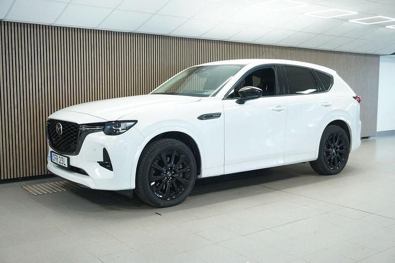 Vit (rhodium white pearl ) Begagnad 2023 Mazda CX-60 Homura-Line SUV | 460 000 kr (Marknadspris) - Bild 1/4