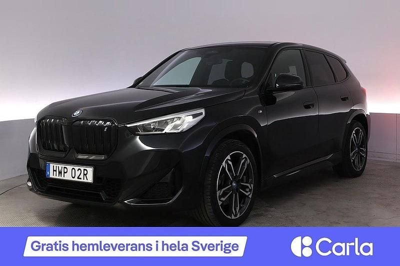 Svart Begagnad 2022 BMW iX1 Shadowline SUV | 444 990 kr (Marknadspris) - Bild 1/4