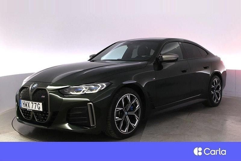 Grön Begagnad 2022 BMW i4 M Sport Sedan | 539 900 kr (Marknadspris) - Bild 1/4