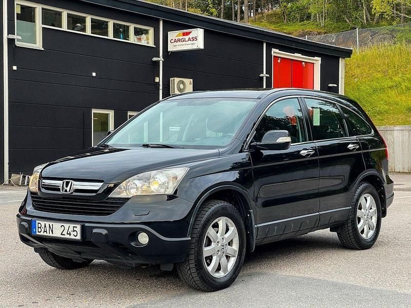 Svart Begagnad 2007 Honda CR-V SUV | 99 900 kr (Marknadspris) - Bild 1/4