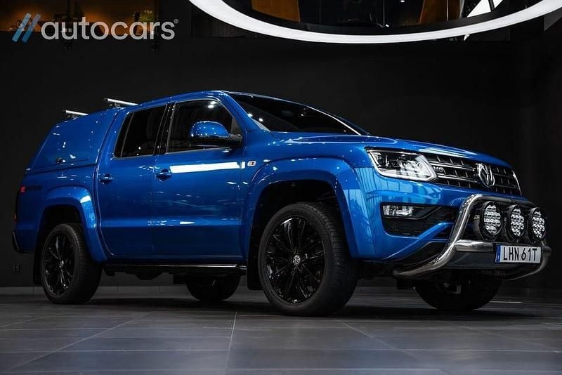 Mörkblå (blå) Begagnad 2020 VW Amarok Aventura Pickup | 698 750 kr - Bild 1/4