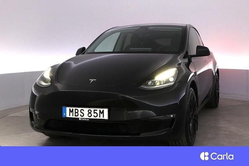 Svart Begagnad 2023 Tesla Model Y Long Range SUV | 464 900 kr - Bild 1/4