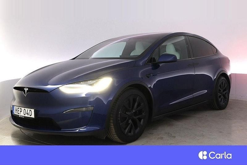 Blå Begagnad 2023 Tesla Model X Long Range AWD SUV | 759 900 kr - Bild 1/4