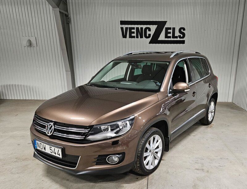 Brun Begagnad 2012 VW Tiguan Sport SUV | 94 000 kr (Marknadspris) - Bild 1/4