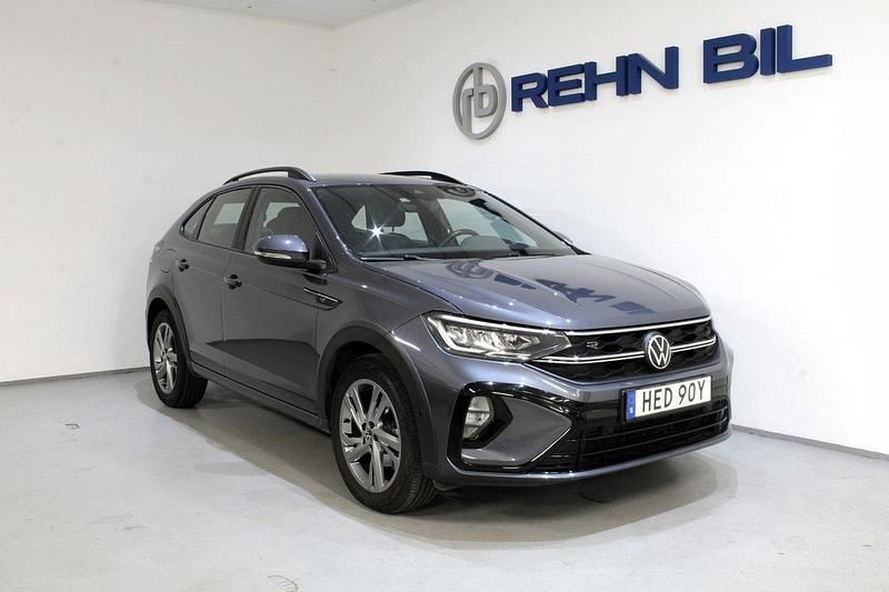 Grå Begagnad 2021 VW Taigo IQ Drive SUV | 219 000 kr (Marknadspris) - Bild 1/4