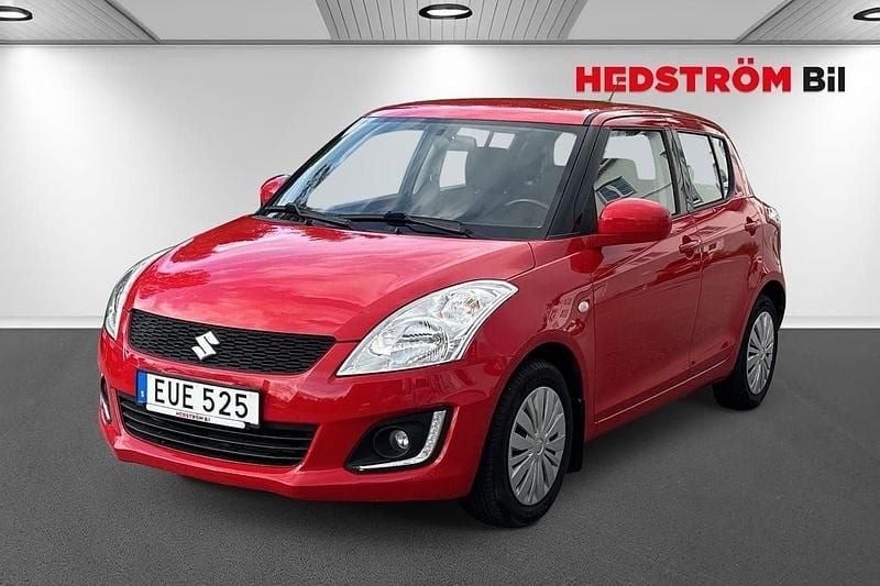 Röd Begagnad 2015 Suzuki Swift Halvkombi | 89 000 kr (Marknadspris) - Bild 1/4