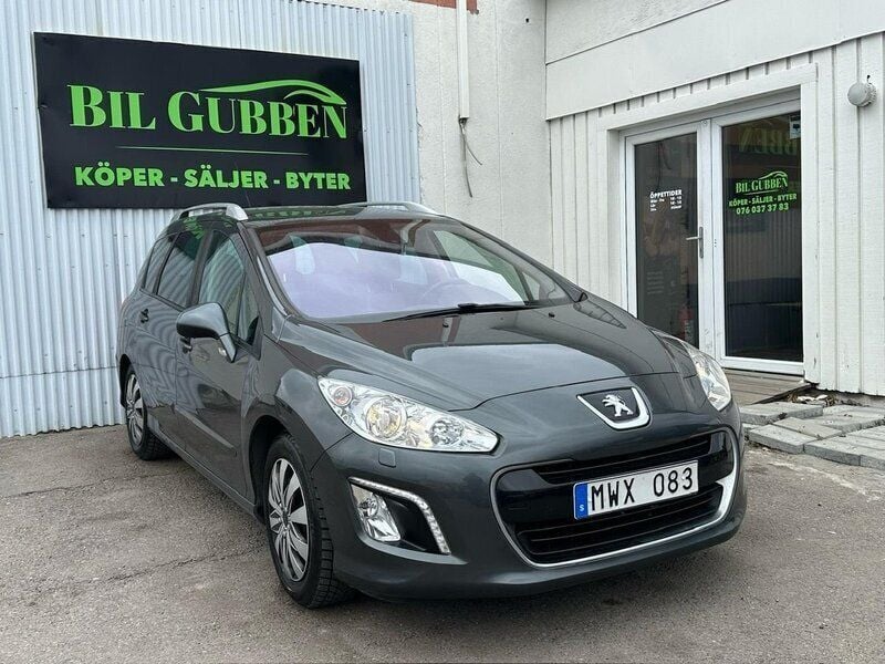 Mörkgrå (grå) Begagnad 2012 Peugeot 308 Kombi | 54 999 kr (Marknadspris) - Bild 1/4