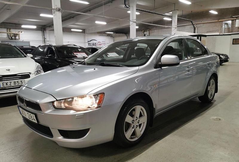 Silver Begagnad 2008 Mitsubishi Lancer Sedan | 56 900 kr - Bild 1/4
