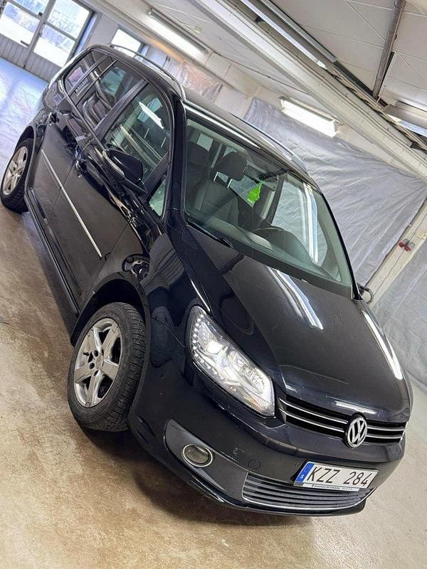 Svart Begagnad 2011 VW Touran Minibuss | 87 000 kr (Marknadspris) - Bild 1/4