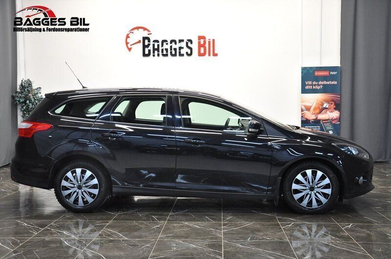 Svart Begagnad 2013 Ford Focus Kombi | 55 900 kr (Marknadspris) - Bild 1/4