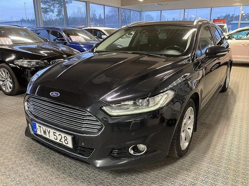 Svart metallic Begagnad 2015 Ford Mondeo Titanium Kombi | 75 900 kr (Marknadspris) - Bild 1/4