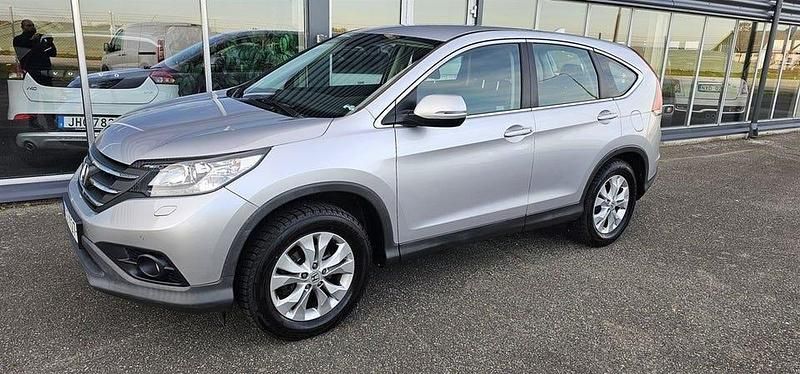 Silver (silver metallic) Begagnad 2014 Honda CR-V SUV | 159 900 kr (Marknadspris) - Bild 1/4