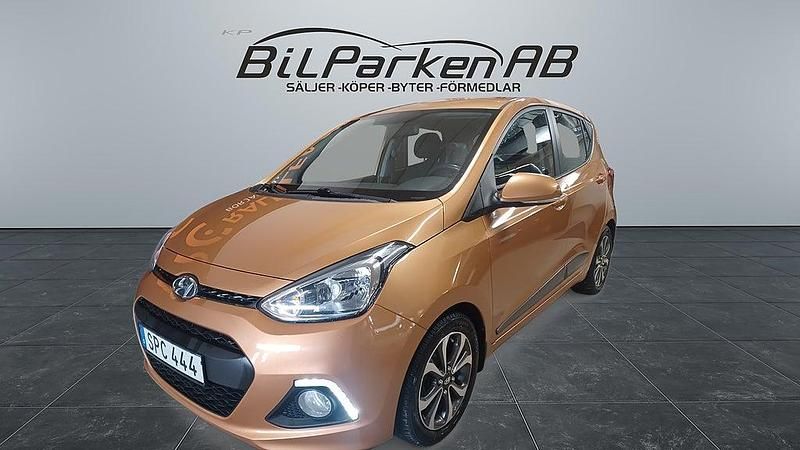 Begagnad Hyundai i10 Premium 87 HK (63 kW) 2014 Orange Halvkombi