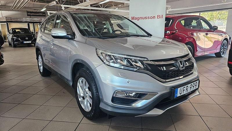 Silver Begagnad 2015 Honda CR-V Elegance Plus SUV | 189 000 kr (Marknadspris) - Bild 1/4