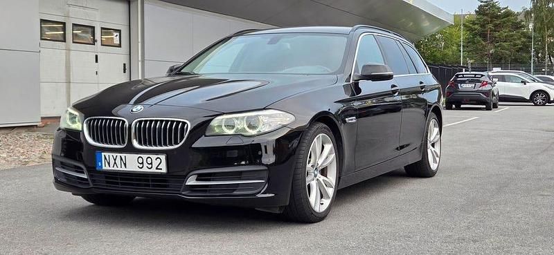 Begagnad BMW 520 Comfort Edition 184 HK (135 kW) 2014 Svart Kombi