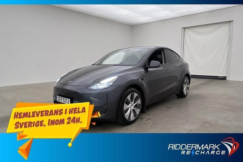 Grå Begagnad 2022 Tesla Model Y Long Range AWD SUV | 358 900 kr (Marknadspris) - Bild 1/3