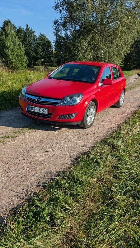 Röd Begagnad 2012 Opel Astra Halvkombi | 47 500 kr (Marknadspris) - Bild 1/4