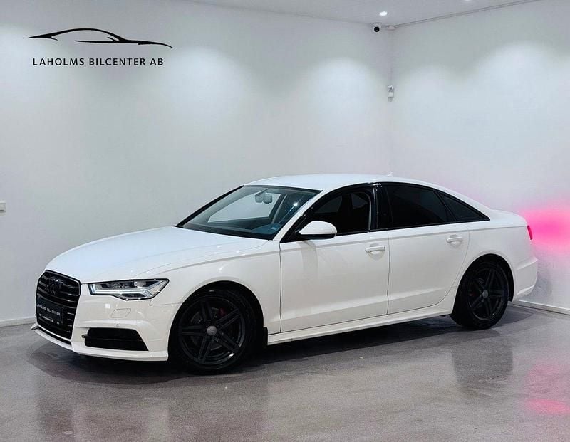 Vit Begagnad 2018 Audi A6 Ambition Sedan | 209 900 kr (Marknadspris) - Bild 1/4