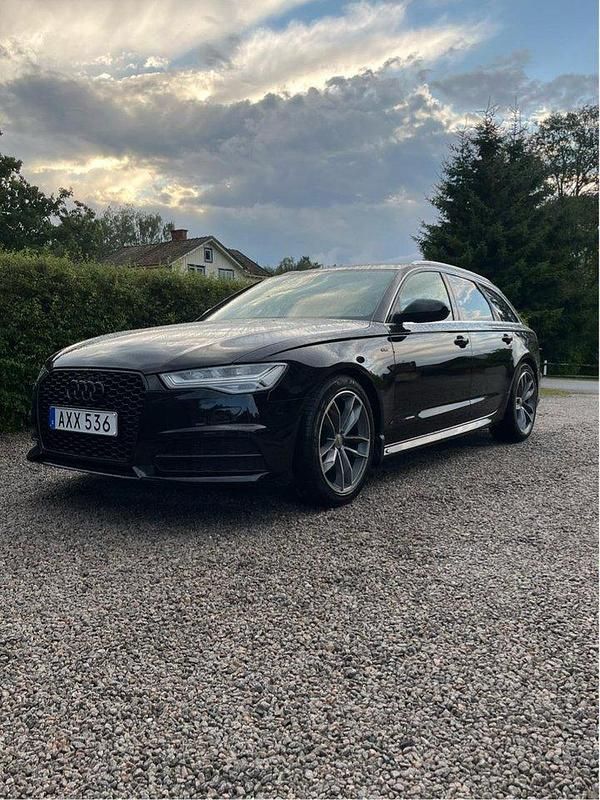 Svart Begagnad 2018 Audi A6 Ambition Kombi | 199 900 kr (Marknadspris) - Bild 1/4