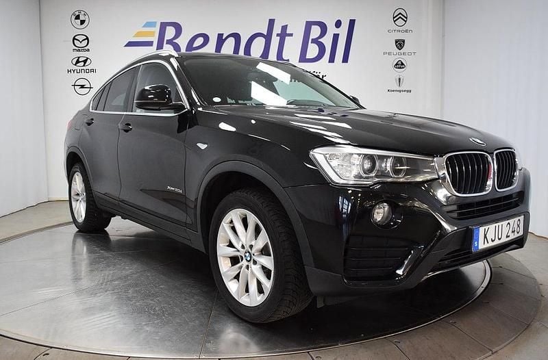Svart Begagnad 2015 BMW X4 SUV | 209 500 kr (Marknadspris) - Bild 1/4