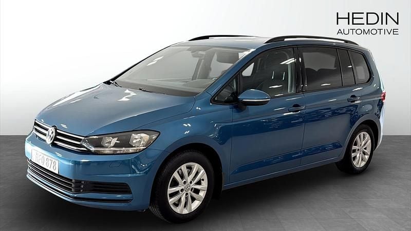 Blå (blue) Begagnad 2016 VW Touran Minibuss | 144 900 kr (Marknadspris) - Bild 1/4