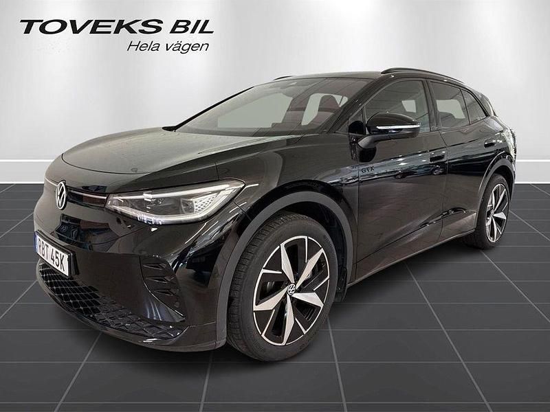 Svart (grenadilla black metallic) Begagnad 2025 VW ID.4 GTX SUV | 599 000 kr - Bild 1/4