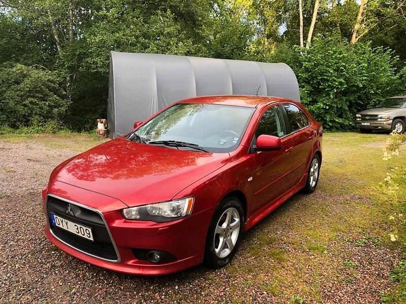 Röd Begagnad 2012 Mitsubishi Lancer Sportback Halvkombi | 30 000 kr (Marknadspris) - Bild 1/2