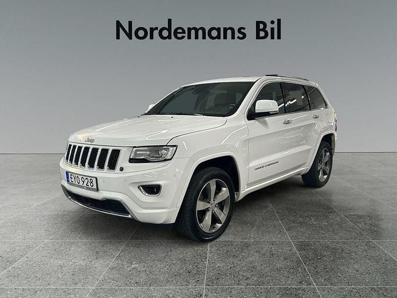 Vit Begagnad 2015 Jeep Grand Cherokee Overland SUV | 258 800 kr (Marknadspris) - Bild 1/4