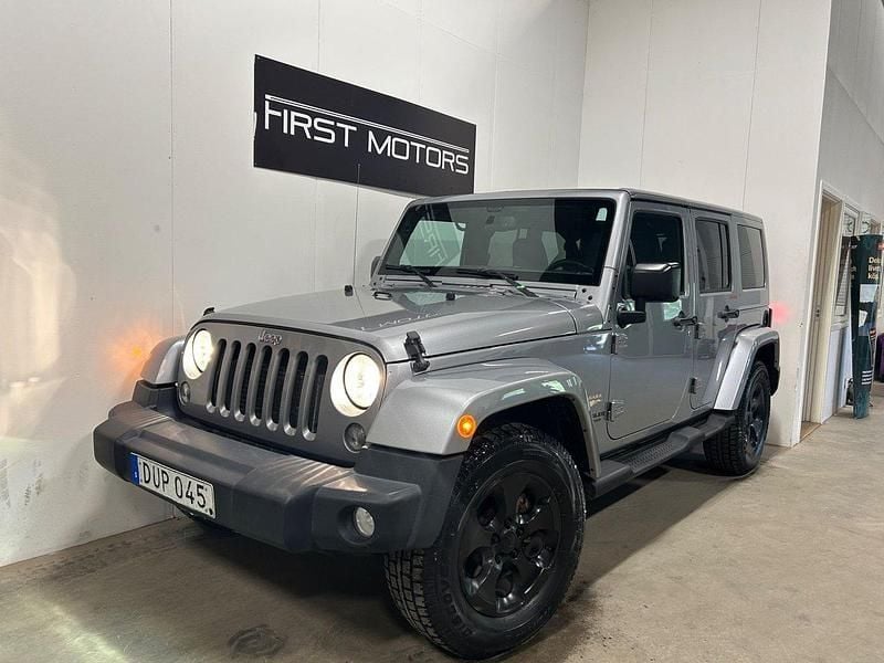Grå Begagnad 2015 Jeep Wrangler Unlimited SUV | 269 900 kr - Bild 1/4