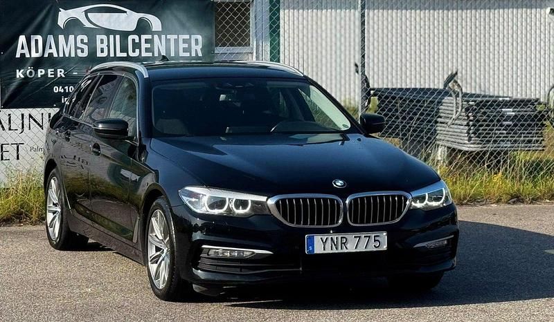 Svart Begagnad 2017 BMW 520 Kombi | 190 900 kr (Marknadspris) - Bild 1/4